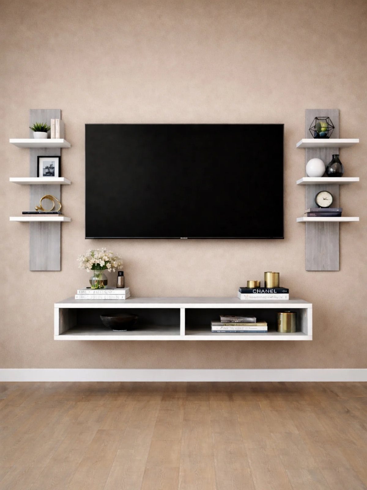 A black television mounted on a beige wall above a white floating media console.